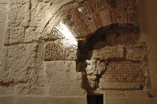 Ray of sunlight on Moorish arch - Cordoba Spain