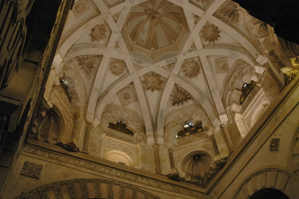 Moorish dome with interlaced ribs, shell-like encrustations and laticed windows.
