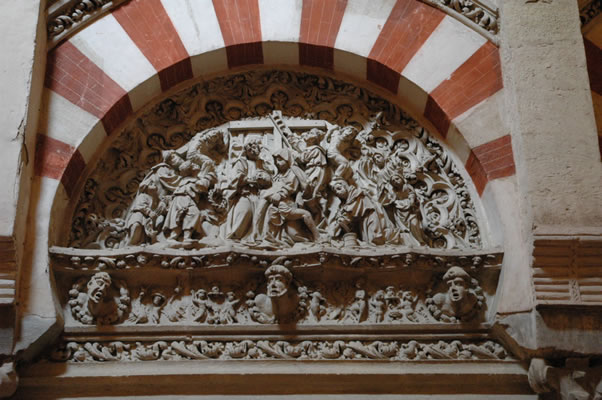 Pieta relief under Islamic arch in Mosque-Cathedral of Cordoba