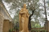 Kingly statue in Alcazar gardens