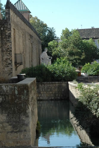 Cordoba City Walls and statue of the Philosopher Averroes
